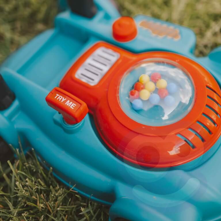 Žaislinė vejapjovė Woopie Su šalmu, kanistru ir kamuoliukais