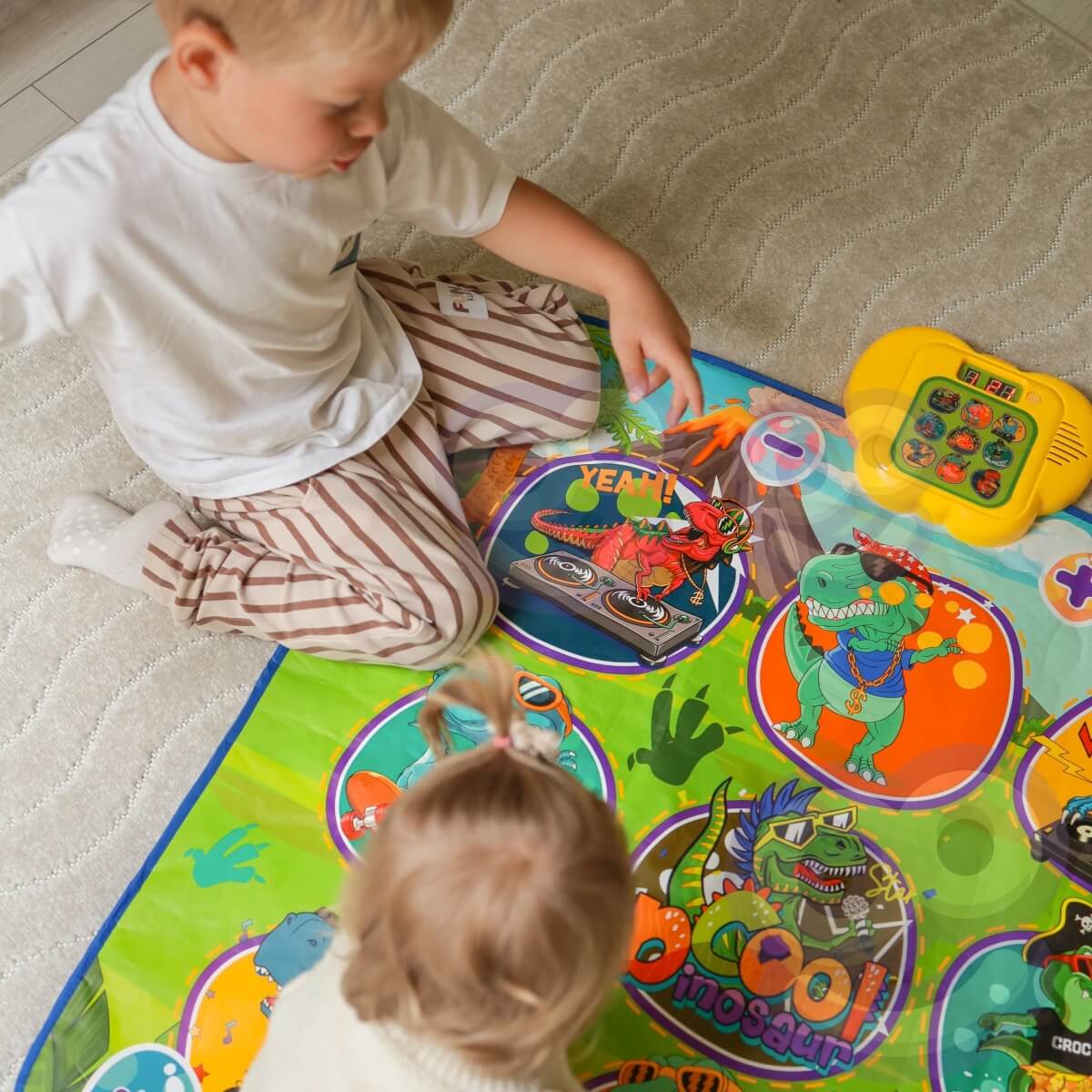 Muzikinis kilimėlis Dinosaur Music Mat su dinozaurais ir šokiais