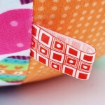 Žaislinis minkštas sensorinis kamuoliuks su kilpomis ir garsais, Woopie