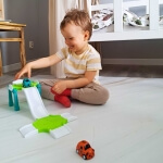 Žaislinė mašinėlių trasa su kelio ženklais ir 3 mašinėlėmis, Woopie