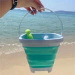 Žaislinis sulankstomas silikonis kibirėlis su kastuvėliu ir grėbliuku, Woopie